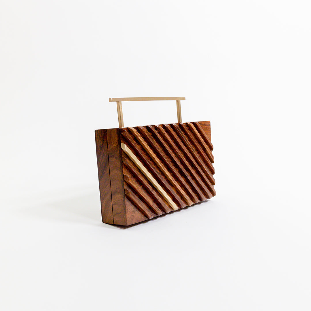 Clutch con borde reluciente