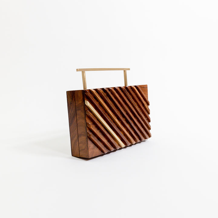 Clutch con borde reluciente