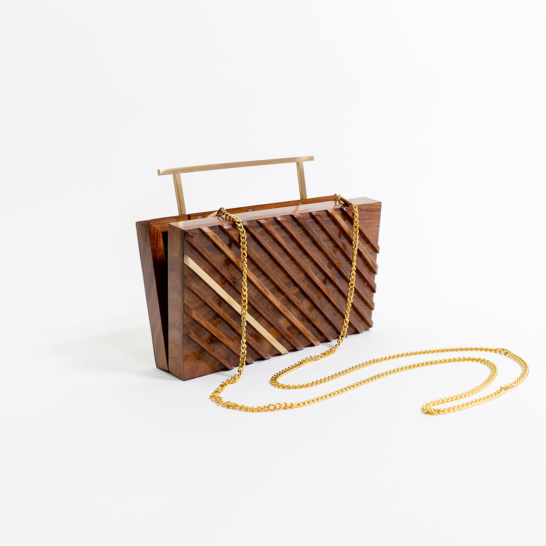 Clutch con borde reluciente